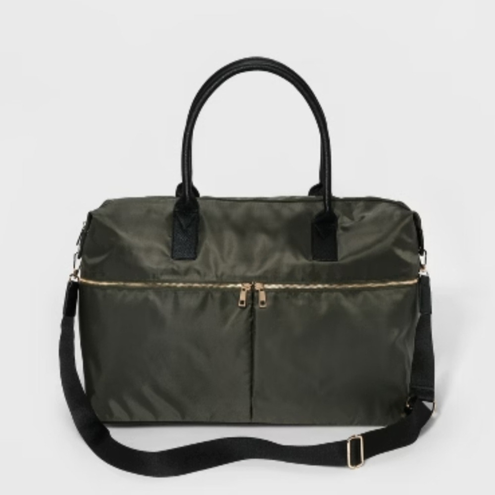 Olive Green Duffel Bag with Black Straps has a few scuffs